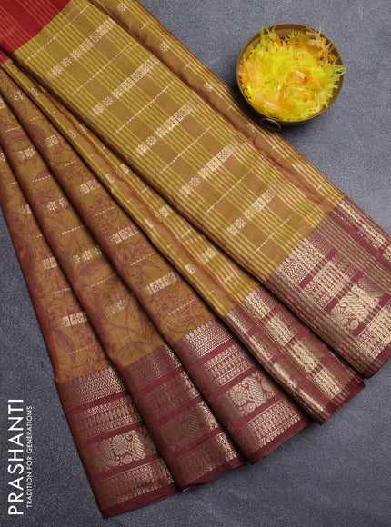 Semi raw silk saree maroon shade and mehendi green brown with allover half & half style and zari woven border