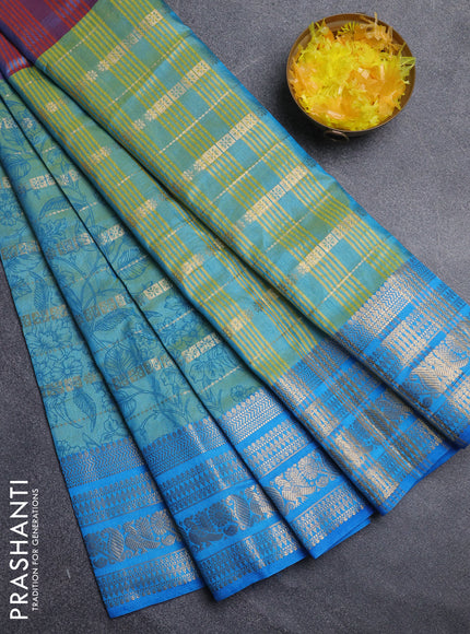 Semi raw silk saree dual shade of bluish maroon and teal bluish green with allover half & half style and zari woven border