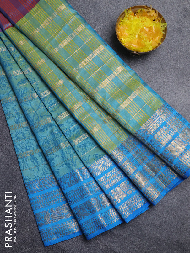Semi raw silk saree dual shade of bluish maroon and teal bluish green with allover half & half style and zari woven border