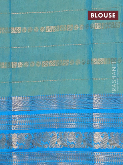 Semi raw silk saree dual shade of bluish maroon and teal bluish green with allover half & half style and zari woven border
