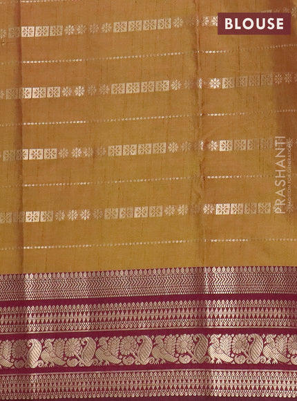 Semi raw silk saree maroon and mehendi green wine shade with allover half & half style and zari woven border