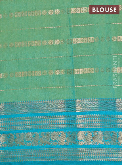 Semi raw silk saree dual shade of maroon and light green teal green with allover half & half style and zari woven border