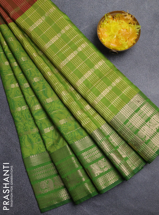 Semi raw silk saree manthulir green and light green with allover half & half style and zari woven border