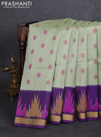Ikat soft silk saree pastel green and violet with allover ikat woven buttas and temple design zari woven buttas