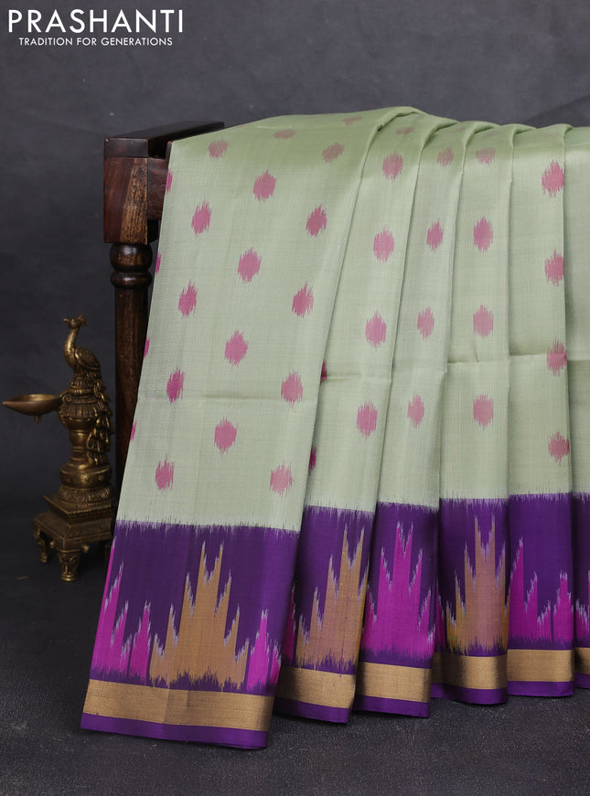 Ikat soft silk saree pastel green and violet with allover ikat woven buttas and temple design zari woven buttas
