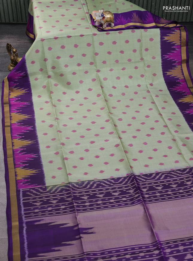 Ikat soft silk saree pastel green and violet with allover ikat woven buttas and temple design zari woven buttas
