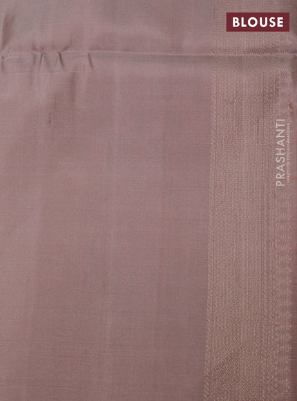 Ikat soft silk saree dual shade of pinkish orange and pastel brown with allover ikat weaves & zari woven buttas and simple border