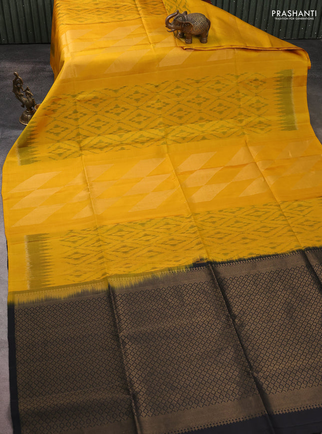 Ikat soft silk saree mustard yellow and black with allover ikat weaves & zari woven buttas and simple border