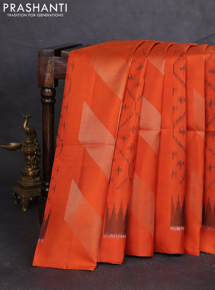 Ikat soft silk saree orange and pastel brown with allover ikat weaves & zari woven buttas and simple border