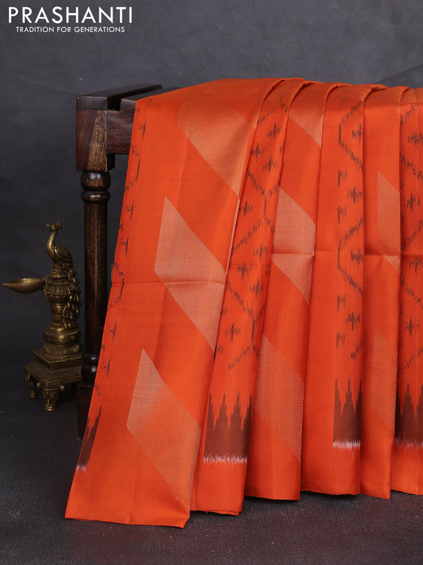 Ikat soft silk saree orange and pastel brown with allover ikat weaves & zari woven buttas and simple border
