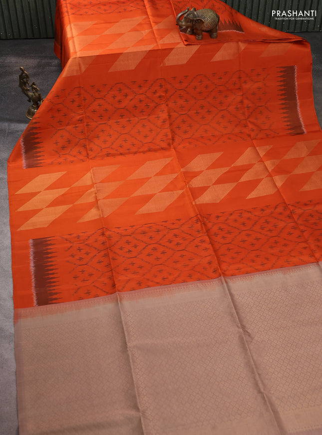 Ikat soft silk saree orange and pastel brown with allover ikat weaves & zari woven buttas and simple border