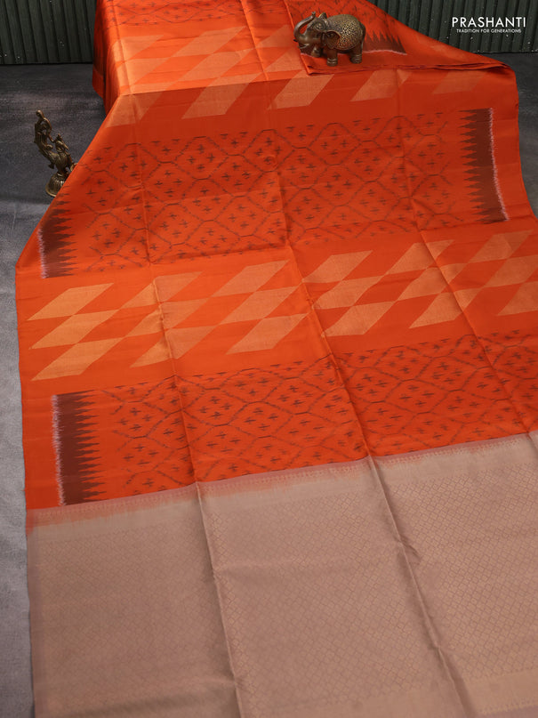 Ikat soft silk saree orange and pastel brown with allover ikat weaves & zari woven buttas and simple border