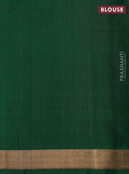 Ikat soft silk saree dual shade of pinkish orange and bottle green with allover ikat weaves & zari woven buttas and zari woven border