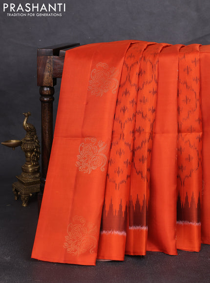 Ikat soft silk saree orange and pastel brown with allover ikat weaves & zari buttas and simple border