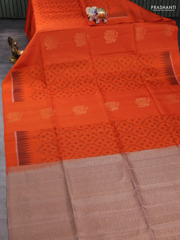 Ikat soft silk saree orange and pastel brown with allover ikat weaves & zari buttas and simple border
