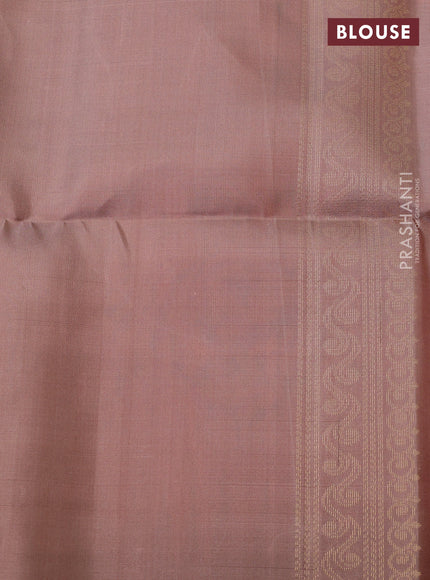Ikat soft silk saree orange and pastel brown with allover ikat weaves & zari buttas and simple border