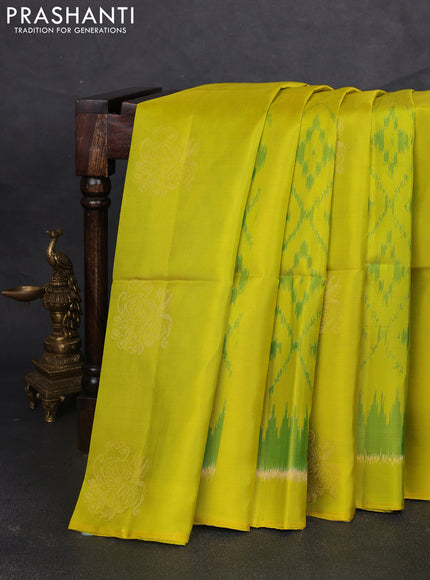 Ikat soft silk saree lime green and cs blue with allover ikat weaves & zari buttas and simple border