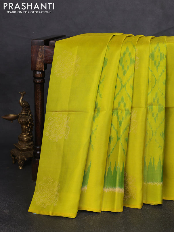 Ikat soft silk saree lime green and cs blue with allover ikat weaves & zari buttas and simple border