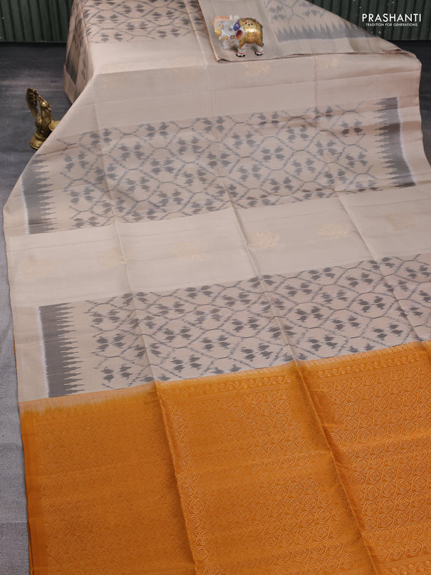 Ikat soft silk saree beige and dark mustard with allover ikat weaves & zari buttas and simple border