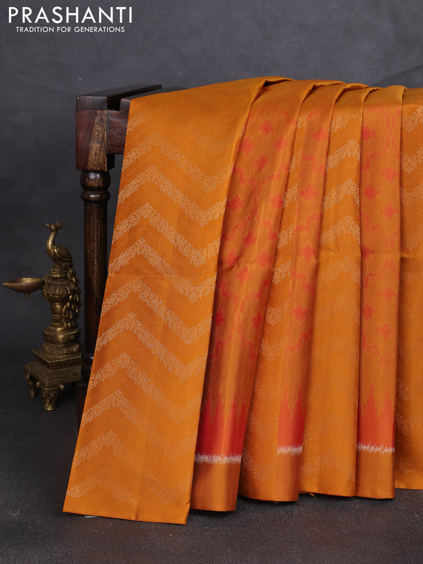 Ikat soft silk saree dark mustard and red with ikat & zari weaves and simple border