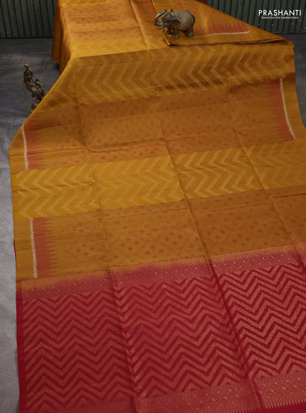 Ikat soft silk saree dark mustard and red with ikat & zari weaves and simple border