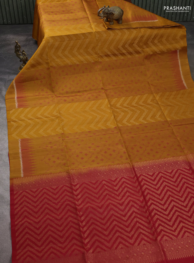 Ikat soft silk saree dark mustard and red with ikat & zari weaves and simple border