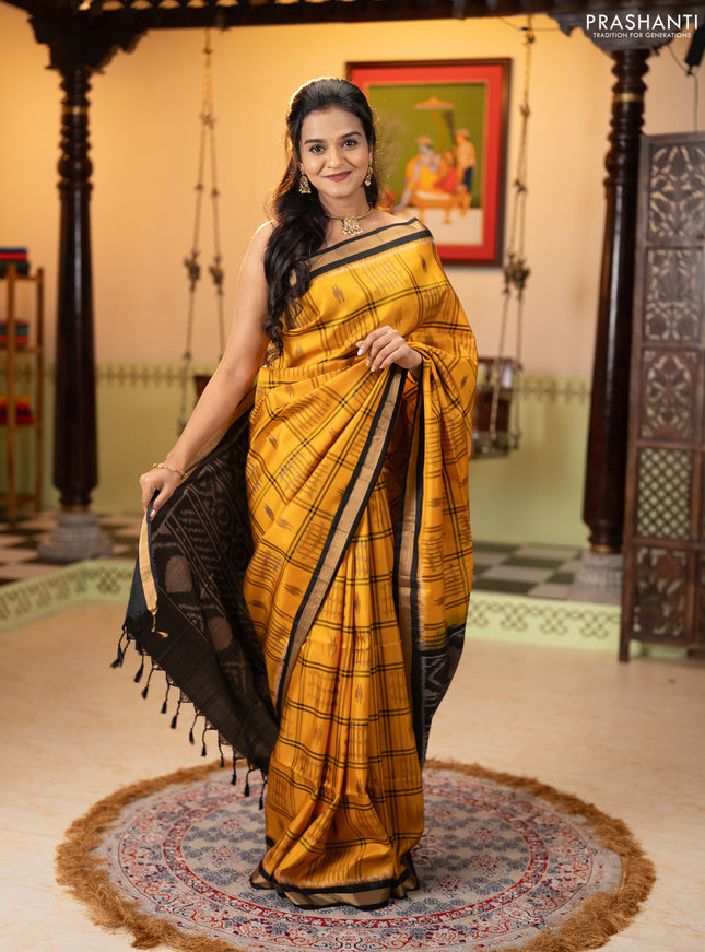 Ikat soft silk saree mustard yellow and black with allover checks & ikat woven buttas and zari woven border