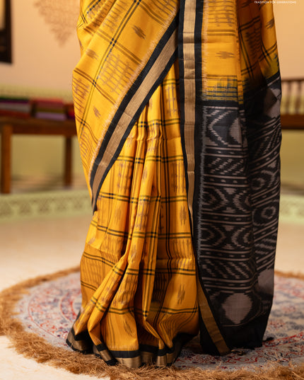 Ikat soft silk saree mustard yellow and black with allover checks & ikat woven buttas and zari woven border
