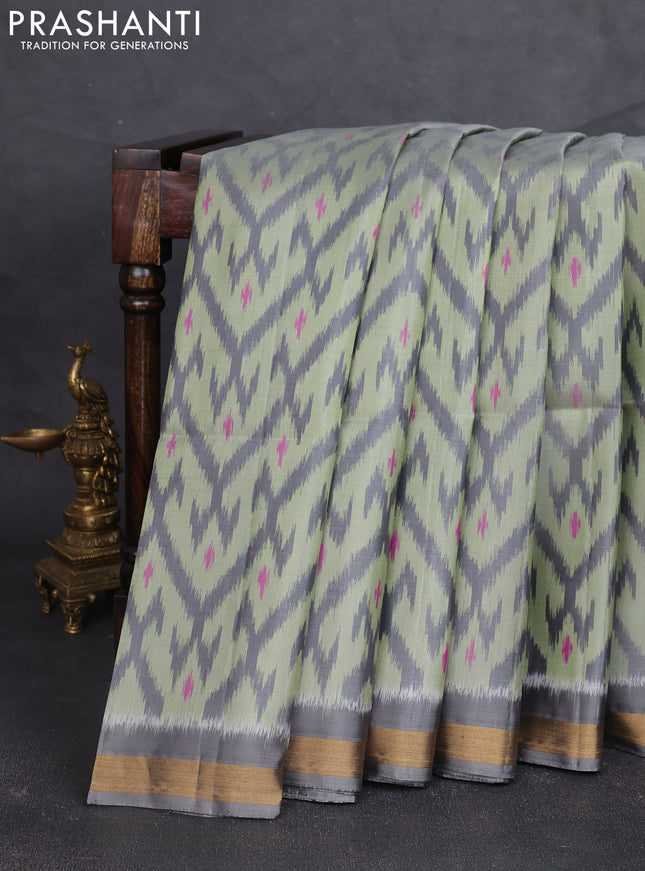 Ikat soft silk saree pastel green and grey with allover ikat weaves and zari woven border