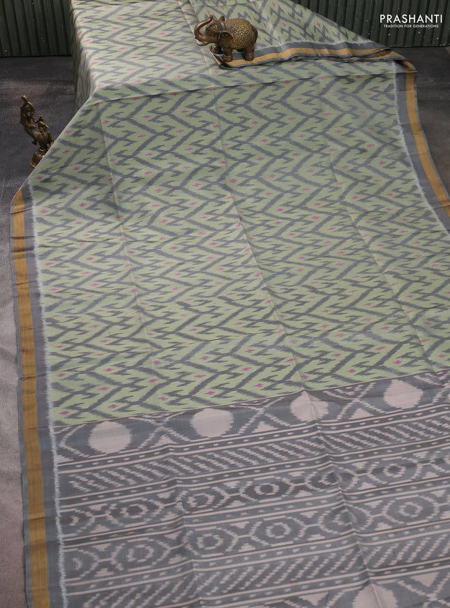 Ikat soft silk saree pastel green and grey with allover ikat weaves and zari woven border