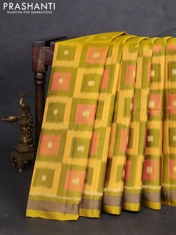 Ikat soft silk saree mustard green and yellow with allover ikat checks buttas and zari woven border