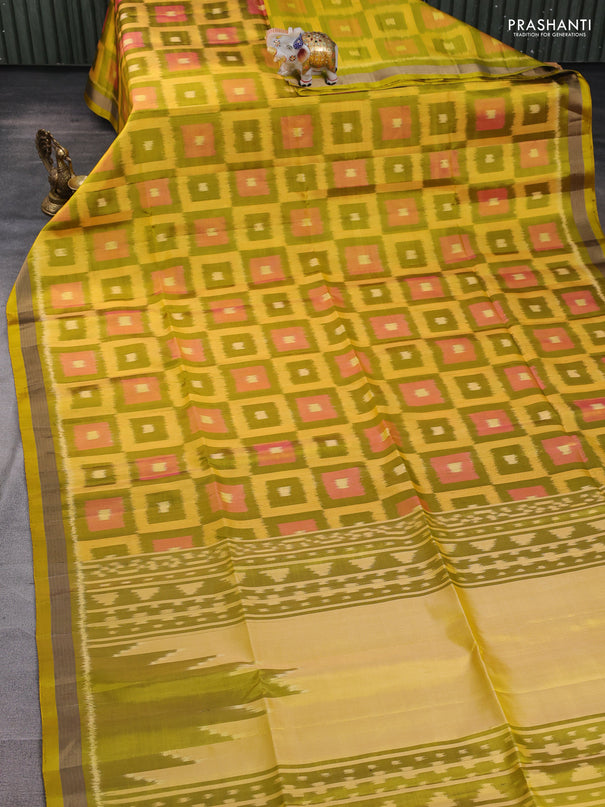 Ikat soft silk saree mustard green and yellow with allover ikat checks buttas and zari woven border