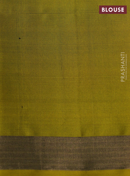 Ikat soft silk saree mustard green and yellow with allover ikat checks buttas and zari woven border