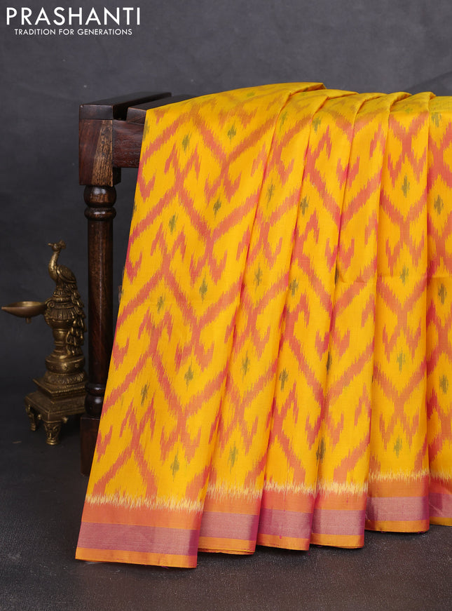 Ikat soft silk saree yellow and sunset orange with allover ikat weaves and zari woven border