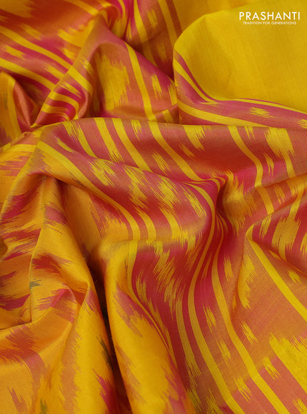 Ikat soft silk saree yellow and sunset orange with allover ikat weaves and zari woven border
