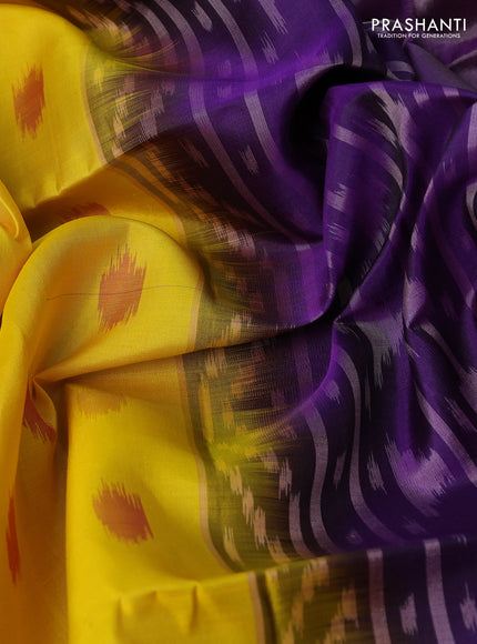 Ikat soft silk saree yellow and violet with allover ikat woven buttas and temple design zari woven border