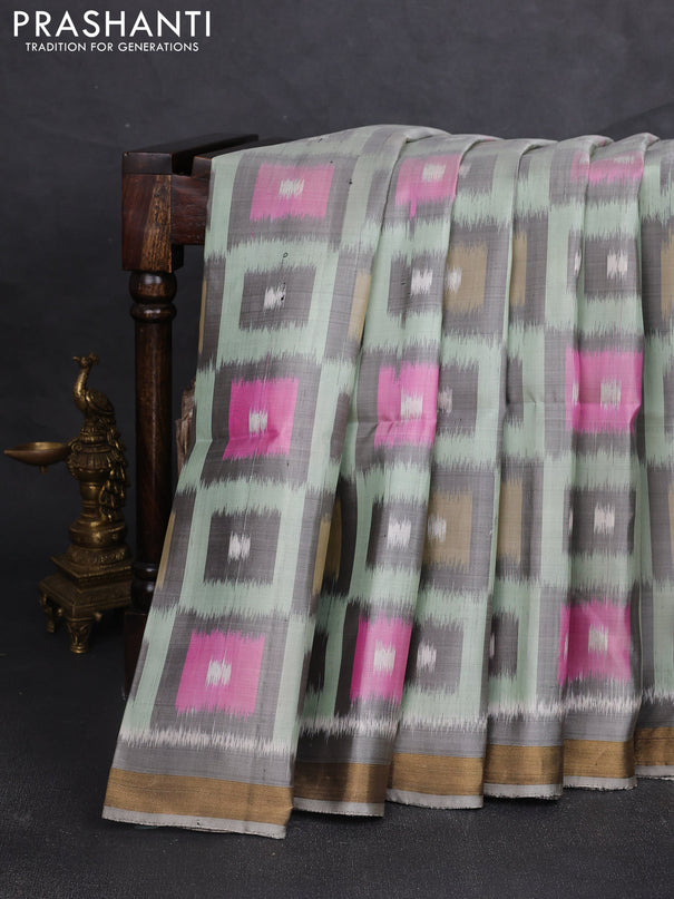 Ikat soft silk saree pastel green and grey with allover ikat woven buttas and zari woven border