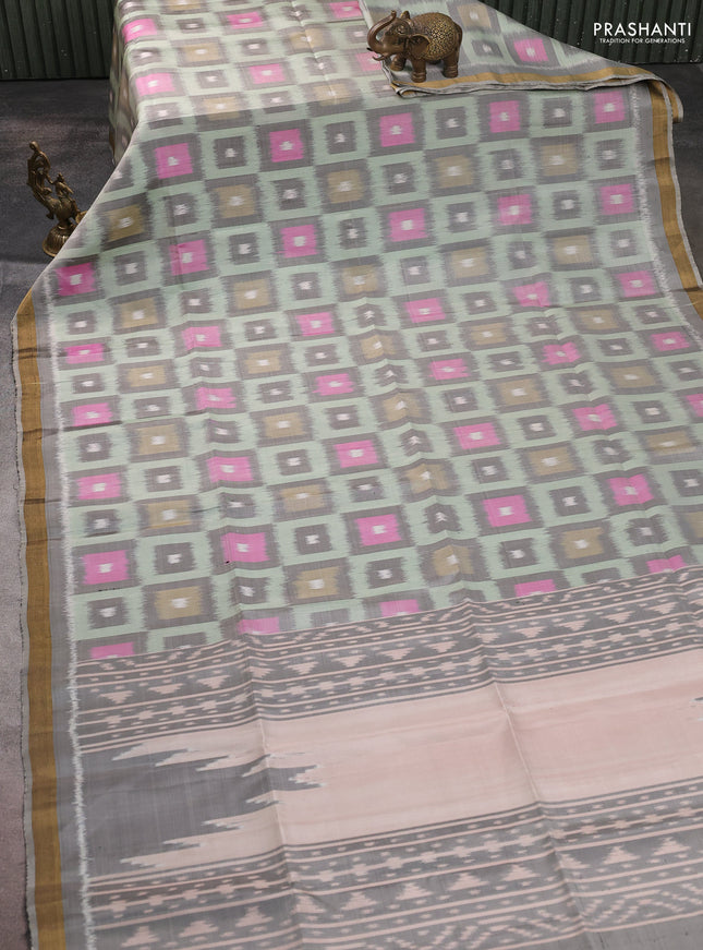 Ikat soft silk saree pastel green and grey with allover ikat woven buttas and zari woven border