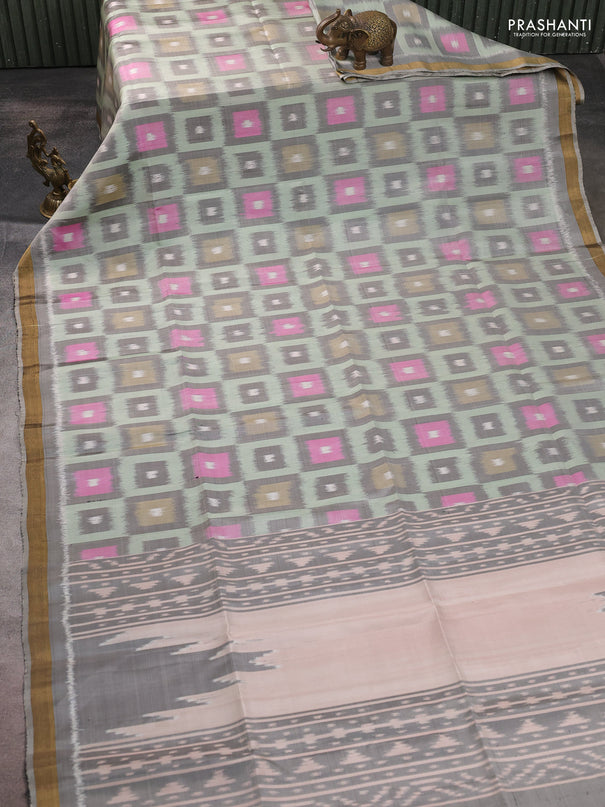 Ikat soft silk saree pastel green and grey with allover ikat woven buttas and zari woven border