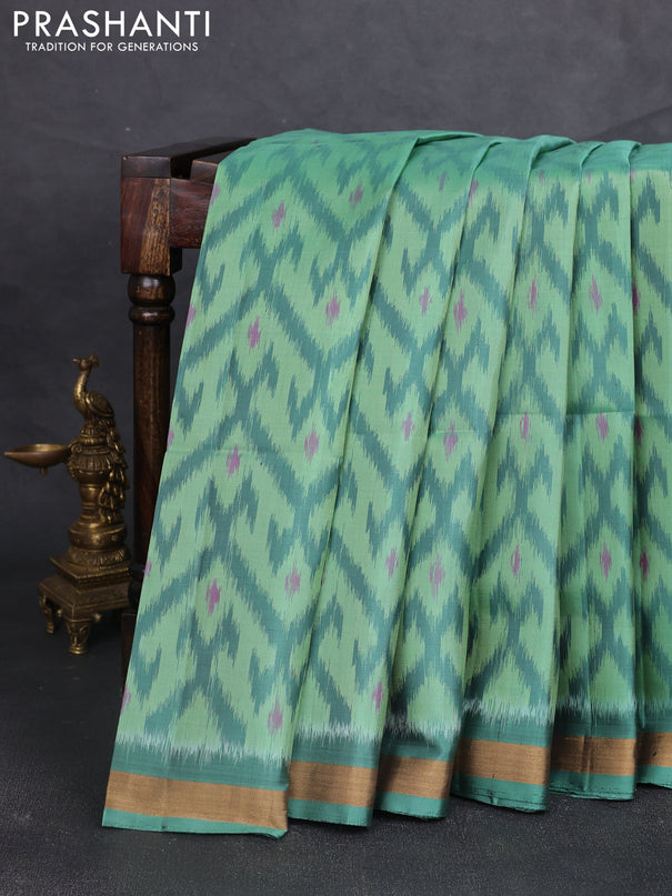 Ikat soft silk saree teal green with allover ikat weaves and zari woven border