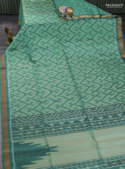 Ikat soft silk saree teal green with allover ikat weaves and zari woven border
