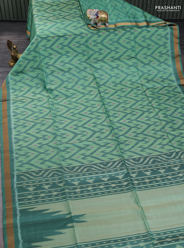 Ikat soft silk saree teal green with allover ikat weaves and zari woven border