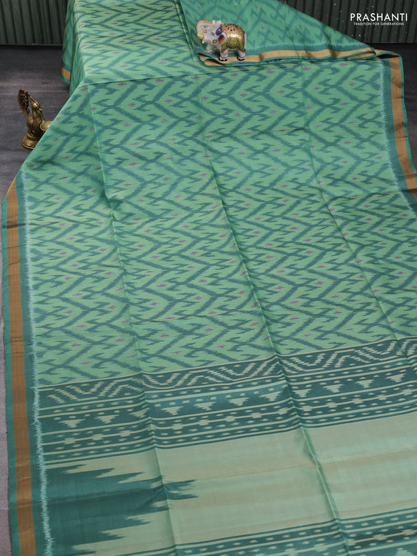 Ikat soft silk saree teal green with allover ikat weaves and zari woven border