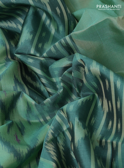 Ikat soft silk saree teal green with allover ikat weaves and zari woven border