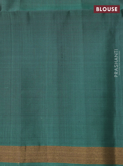 Ikat soft silk saree teal green with allover ikat weaves and zari woven border