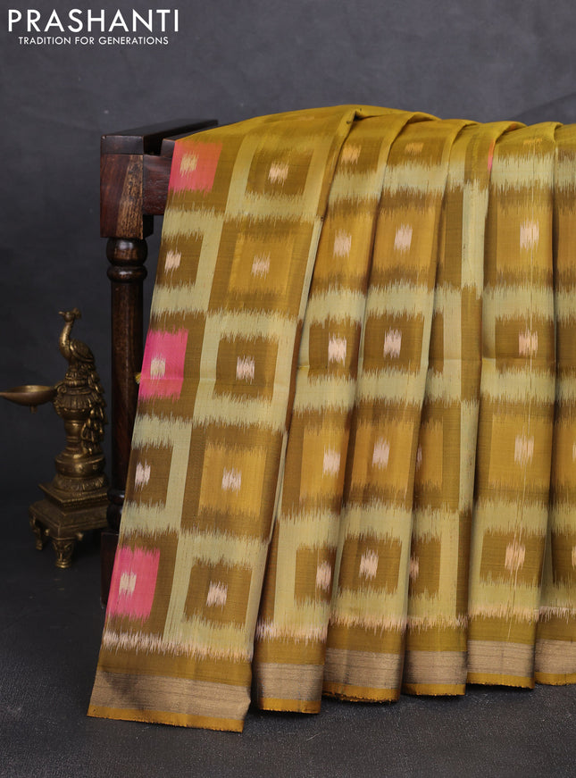 Ikat soft silk saree mustard green and pale orange with allover ikat woven buttas and zari woven border