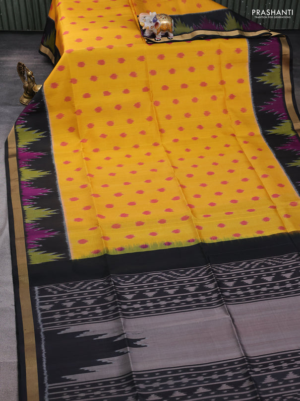 Ikat soft silk saree yellow and black with allover ikat woven buttas and zari woven border