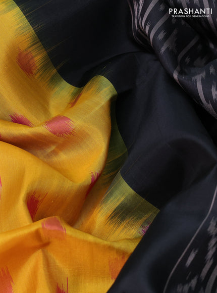 Ikat soft silk saree yellow and black with allover ikat woven buttas and zari woven border