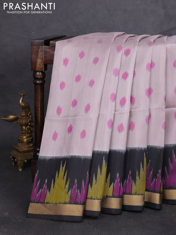 Ikat soft silk saree pastel grey and black with allover ikat woven buttas and temple design zari woven border