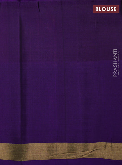 Ikat soft silk saree orange and violet with allover ikat woven buttas and temple design zari woven border